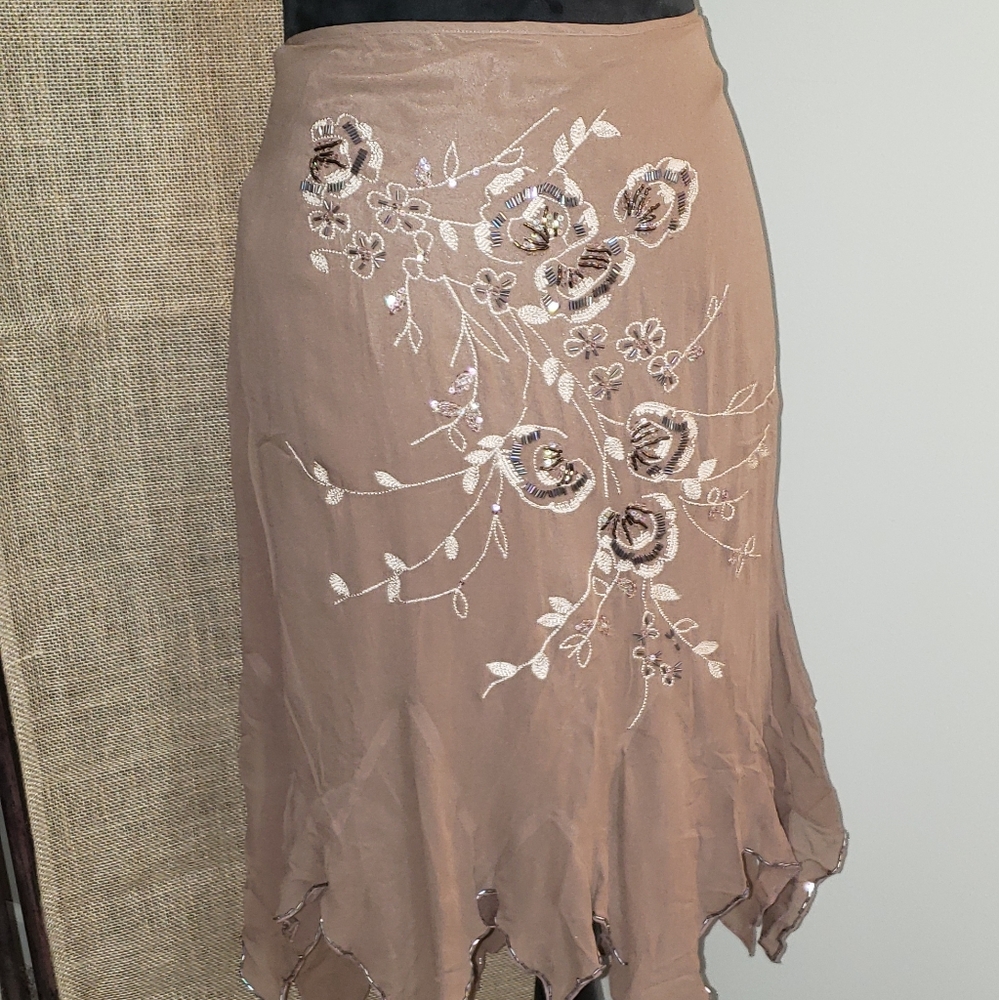 Bebe handkerchief skirt.